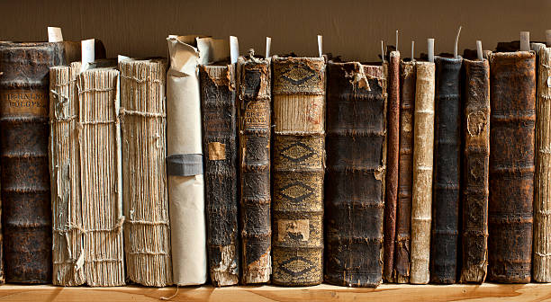 dusty books in a book shelf